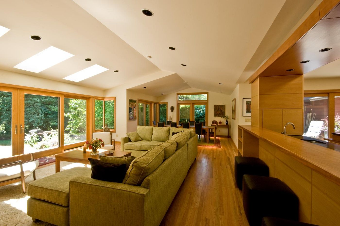 Custom wooden bar area with integrated cabinetry in a living space