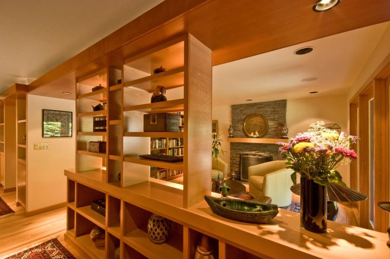 Custom wooden shelving room divider built by KDJ Cabinet Design