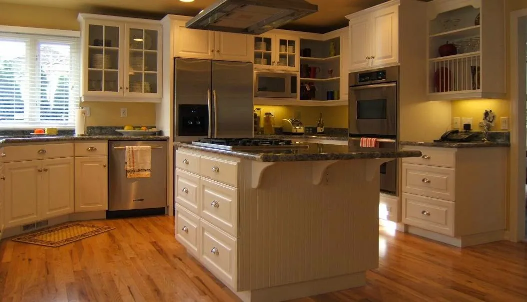 Traditional kitchen with white custom cabinets and island, refaced by KDJ Cabinet Design